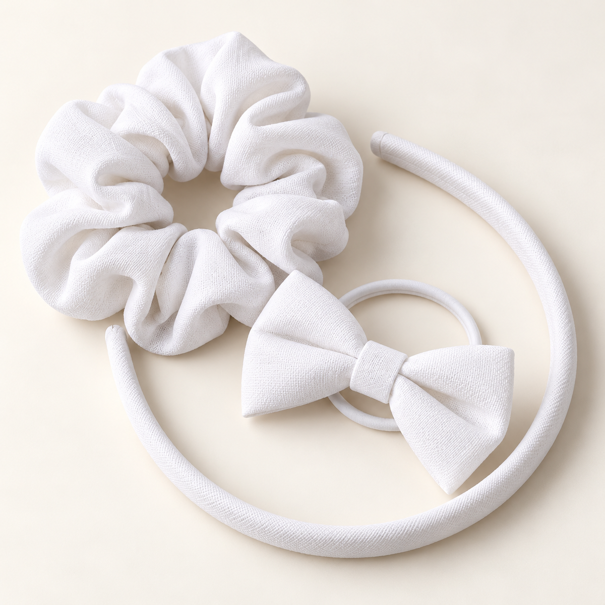 White school hair accessories set with Alice band, scrunchie and bow hair elastic.